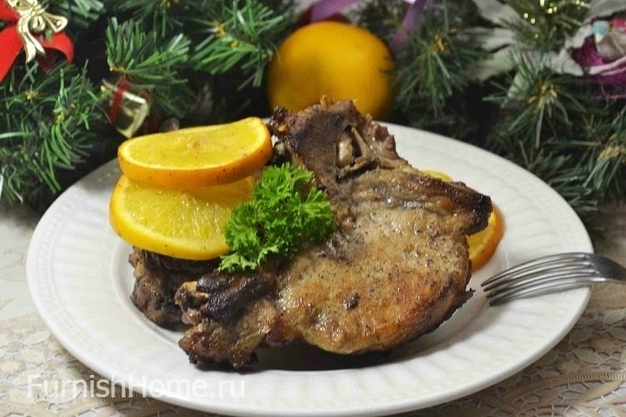 Свинина на кости, запеченная с апельсинами Свинина на кости, запеченная с апельсинами