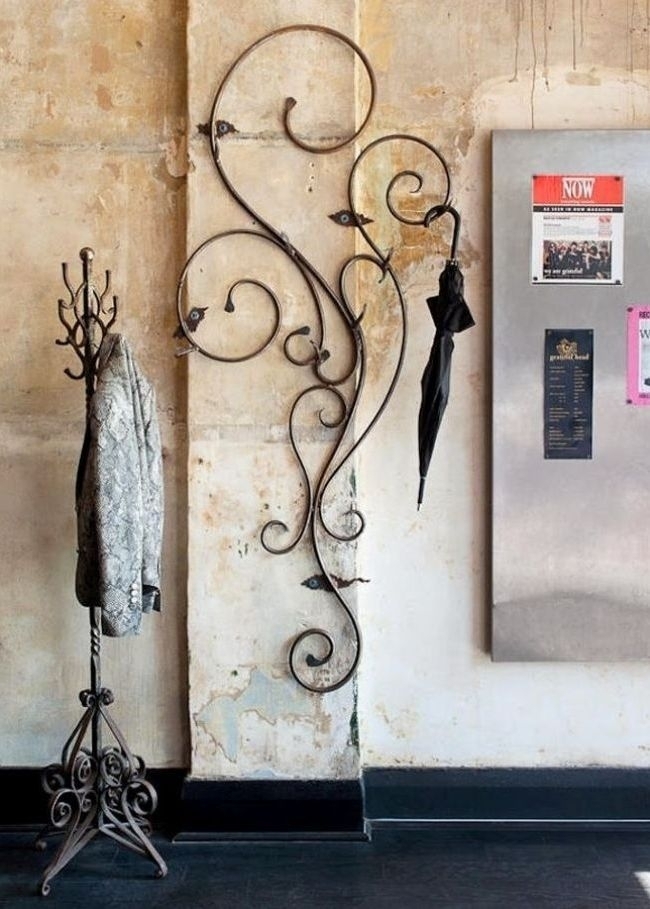 Красивая кованая вешалка для для зонтов и подставка для одежды Красивая кованая вешалка для для зонтов и подставка для одежды