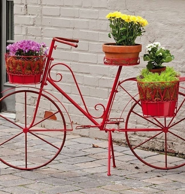 Кованая подставка для цветов стилизованная под велосипед